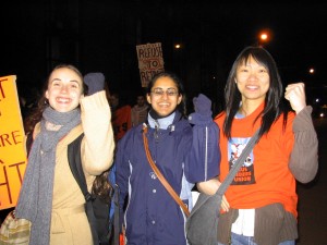 Young women at a vigil and march against poverty in Vancouver. 