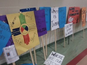 Signs at an October 2012 Saskatoon walk calling for justice for missing and murdered Indigenous women