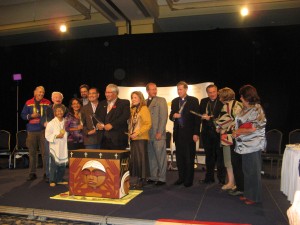 Commissioner Marie Wilson (middle, yellow jacket) with Commissioners, survivors and church leaders at the Halifax National Event, 2011.
