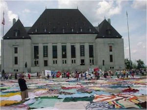 In 2001 KAIROS churches  and networks laid blankets in front of the Supreme Court in Ottawa in support of Aboriginal title and rights.