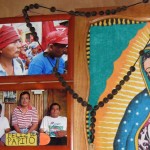 A photo in memory of Adolfo Ich, with the caption 'Happy Father's Day', hangs on the wall of his family home in El Estor.