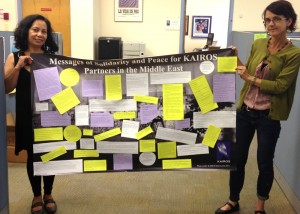 Program Coordinators Connie Sorio and Rachel Warden hold KAIROS Solidarity banner for Partners in the Middle East
