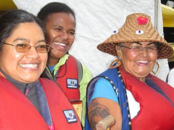 Naty Atz, honorary witness at the TRC National event in BC, joins a boat with members of the local KAIROS group during the opening ceremony, September 2013.