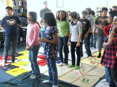 grade 6 students doing the blanket exercise in a school in mississauga in 2010