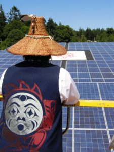 Chief viewing the solar installation. Photo by Shannon Halliday.