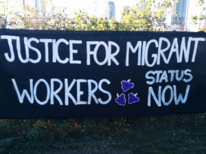 migrant justice banner