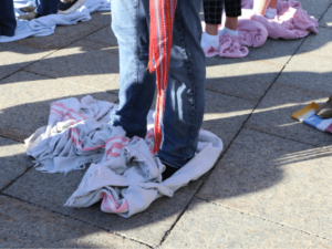 KAIROS Blanket Exercise, feet on a crumbled blanket