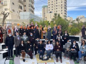 Wi'am staff and workshop participants meet in Bethany in early December 2020 for the campaign against sexual harassment, part of Wi'am's 16 Days of Activism to Eliminate Violence Against Women and Girls.