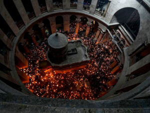 Christian pilgrims during the ceremony of the Holy Fire at Church of the Holy Sepulchre, Jerusalem. (AP Photo/Tsafrir Abayov) 