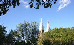 Church spires behind beautiful trees