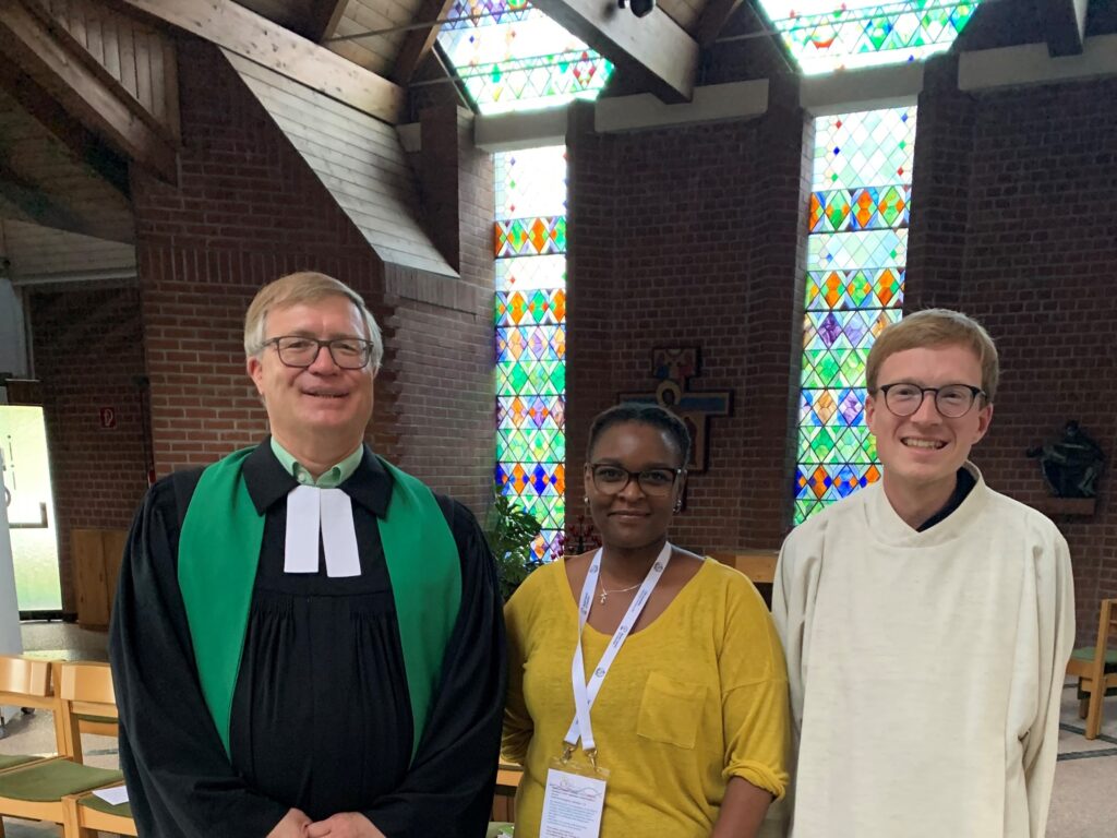 Jane Thirikwa, with Tobias Bartole (R), Catholic Pastoral Care, and Thomas Lehmkuehler (L), Mennonite at the ARCHE ecumenical church center in Neckargemünd.