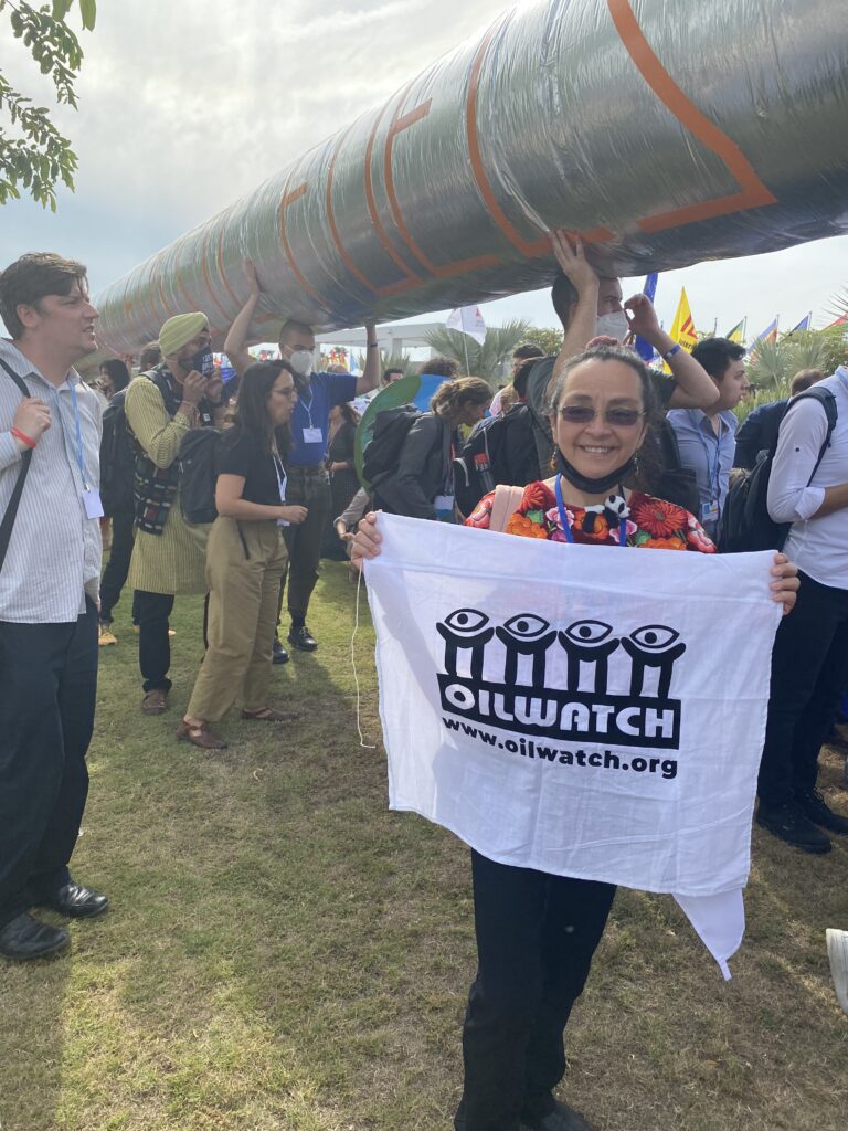 Ivonne Yanez carrying a sign