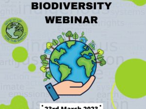 hand holding a globe with the words "Register for Biodiversity Webinar"