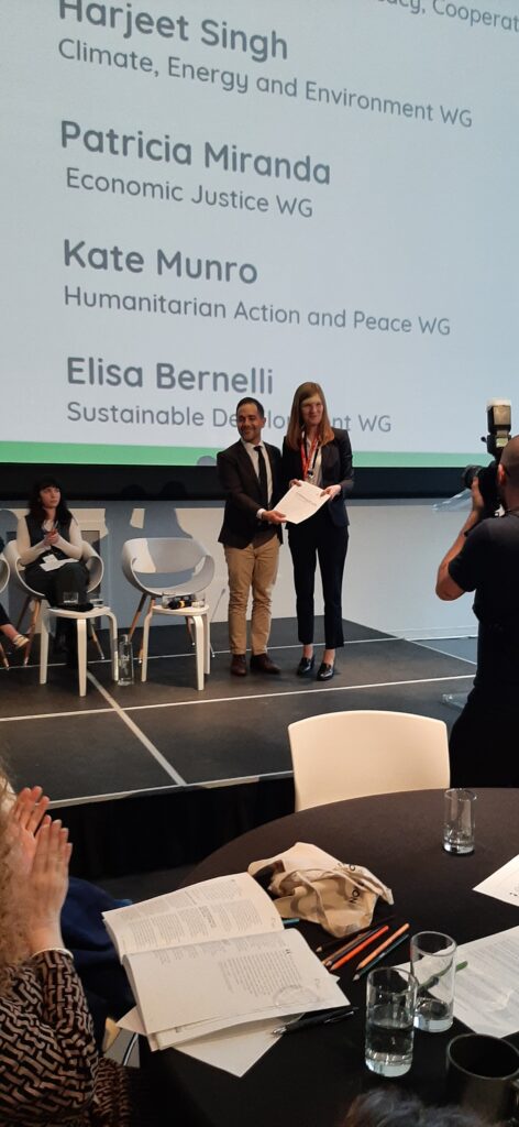 Paul Farron (Cooperation Canada) presents the C7 Communiqué to Cindy Termorshuizen (G7 Sherpa) on the final day of the C7 Summit.